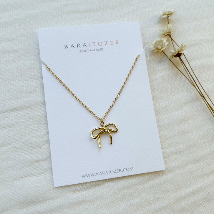 Gold Bow Charm Necklace